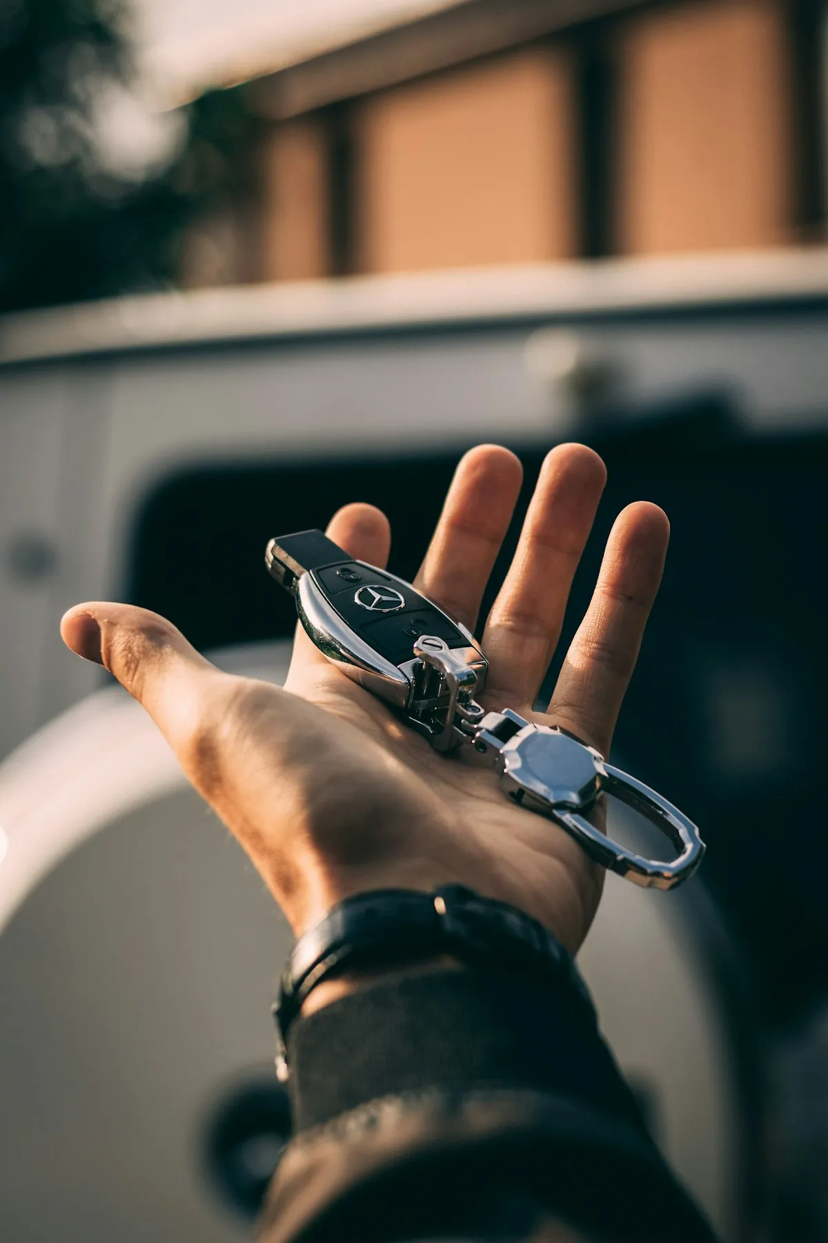 Car keys being handed over